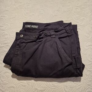 Duluth Trading Co men's 48 x 32 black Flex Fire Hose relaxed fit jeans VGUC